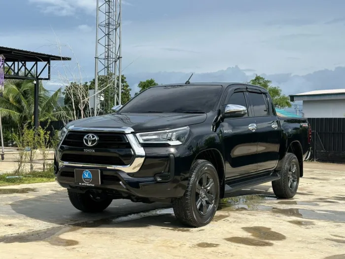 Front view of Toyota Hilux Revo Double Cab year 2021 black color used car in Hatyai