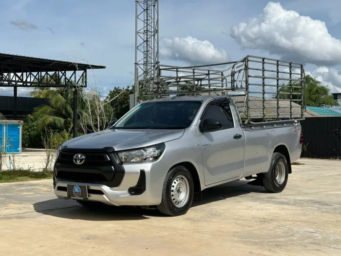 Front view of Toyota Hilux Revo Single Cab 2.8 Entry year 2023 silver color used car with cargo rack in Hatyai